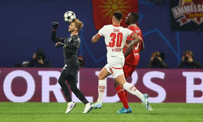 Caoimhin Kelleher of Liverpool heads the ball RB Leipzig v Liverpool, UEFA Champions League, Group Stage, Football, Red Bull Arena, Leipzig, Germany, 23 Oct 2024 EDITORIAL USE ONLY No use with unauthorised audio, video, data, fixture lists, club league logos or live services. Online in-match use limited to 120 images, no video emulation. No use in betting, games or single club league player publications. Copyright: xKieranxMcManus Shutterstockx 14801646s