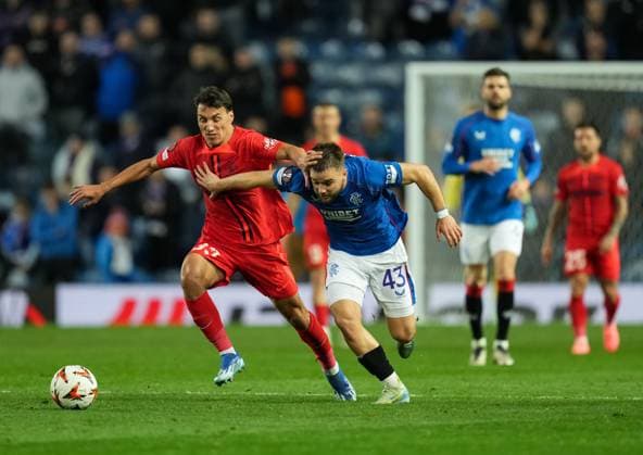 Nicolas Raskin of Rangers challenges for the ball with Risto Radunovic of FCSB. Rangers v FCSB, UEFA Europa League, Group Stage, Football, Ibrox Stadium, Glasgow, Scotland, UK, 24 Oct 2024 EDITORIAL USE ONLY No use with unauthorised audio, video, data, fixture lists, club league logos or live services. Online in-match use limited to 120 images, no video emulation. No use in betting, games or single club league player publications. Copyright: xStuartxWallace Shutterstockx 14801669dq