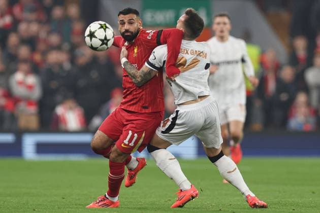 Mohamed Salah of Liverpool battles with Aleix Garcia of Bayer 04 Leverkusen Liverpool v Bayer 04 Leverkusen, UEFA Champions League, Group Stage, Football, Anfield, Liverpool, UK - 05 Nov 2024 EDITORIAL USE ONLY No use with unauthorised audio, video, data, fixture lists, club league logos or live services. Online in-match use limited to 120 images, no video emulation. No use in betting, games or single club league player publications. Copyright: xPaulxCurrie Shutterstockx 14863785bd