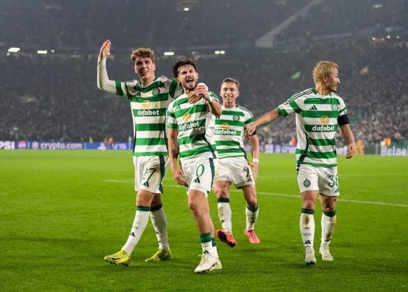 Nicolas Kuhn of Celtic celebrates with Arne Engels, Alistair Johnston & Daizen Maeda of Celtic after scoring his second goal of the game to give Celtic a 2-1 lead just before half-time. Celtic v RB Leipzig, UEFA Champions League, Group Stage, Football, Celtic Park, Glasgow, Scotland, UK - 05 Nov 2024 EDITORIAL USE ONLY No use with unauthorised audio, video, data, fixture lists, club league logos or live services. Online in-match use limited to 120 images, no video emulation. No use in betting, games or single club league player publications. Copyright: xStuartxWallace Shutterstockx 14863772av
