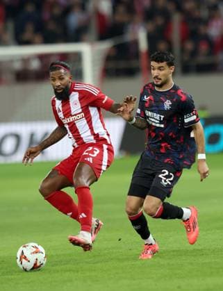 Rodinei of Olympiacos battles for the ball with Jefte of Rangers during the Europa League group phase match at the Stadio Georgios Karaiskakis, Athens. Olympiakos v Rangers, UEFA Europa League, Group Stage, Football, Georgios Karaiskakis Stadium, Pireas, Greece - 07 Nov 2024 EDITORIAL USE ONLY No use with unauthorised audio, video, data, fixture lists, club league logos or live services. Online in-match use limited to 120 images, no video emulation. No use in betting, games or single club league player publications. Copyright: xLukexNickerson RangersxFC Shutterstockx 14878765cr