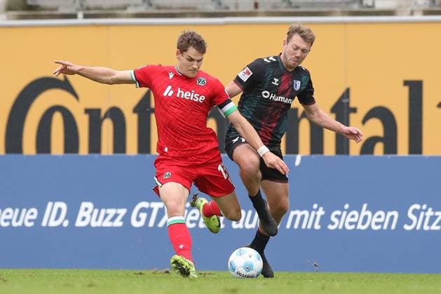 14.11.2024, xtgx, Fussball - Testspiel, Hannover 96 - 1.FC Magdeburg emspor, v.l. Max Christiansen (Hannover, 13), Connor Krempicki (Magdeburg, 13) Zweikampf, Duell, Kampf, tackle (DFL DFB REGULATIONS PROHIBIT ANY USE OF PHOTOGRAPHS as IMAGE SEQUENCES and or QUASI-VIDEO) Hannover