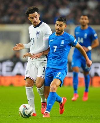 Curtis Jones of England battles with Giorgos Masouras of Greece Greece v England, UEFA Nations League, League B, Group 2, Football, Olympic Stadium, Athens, Greece - 14 Nov 2024 EDITORIAL USE ONLY No use with unauthorised audio, video, data, fixture lists, club league logos or live services. Online in-match use limited to 120 images, no video emulation. No use in betting, games or single club league player publications. Copyright: xJavierxGarcia Shutterstockx 14902321dt
