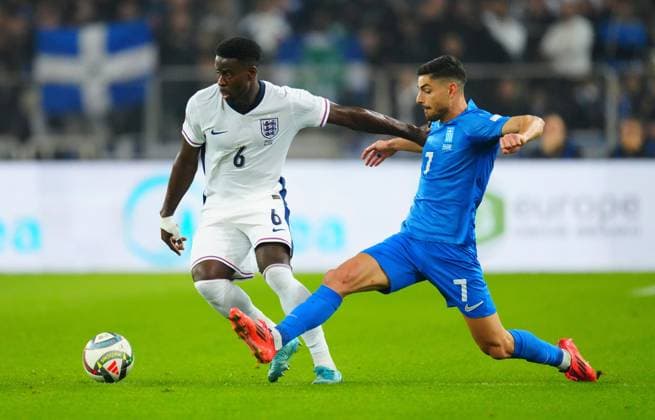 Marc Guà hi of England and Giorgos Masouras of Greece Greece v England, UEFA Nations League, League B, Group 2, Football, Olympic Stadium, Athens, Greece - 14 Nov 2024 EDITORIAL USE ONLY No use with unauthorised audio, video, data, fixture lists, club league logos or live services. Online in-match use limited to 120 images, no video emulation. No use in betting, games or single club league player publications. Copyright: xJavierxGarcia Shutterstockx 14902321ec