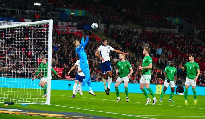 Republic of Ireland goalkeeper Caoimhin Kelleher catches under pressure from Jude Bellingham of England England v Ireland, UEFA Nations League, League B, Group 2, Football, Wembley Stadium, London, UK - 17 Nov 2024 EDITORIAL USE ONLY No use with unauthorised audio, video, data, fixture lists, club league logos or live services. Online in-match use limited to 120 images, no video emulation. No use in betting, games or single club league player publications. Copyright: xJavierxGarcia Shutterstockx 14902695ab