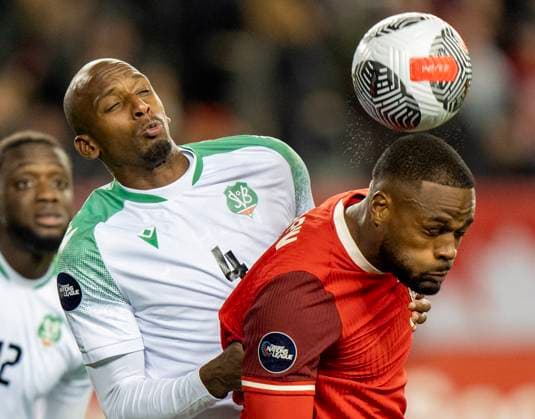 November 19, 2024, Toronto, On, CANADA: Canada forward Cyle Larin, right, and Suriname midfielder Dion Malone (4) battle for a header in CONCACAF Nations League action in Toronto, Tuesday, Nov. 19, 2024. Canada News - November 19, 2024 - ZUMAc35_ 20241119_zaf_c35_139 Copyright: xFrankxGunnx