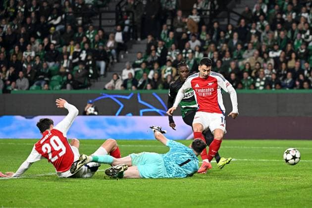 Gabriel Martinelli of Arsenal scores the opening goal Sporting Lisbon v Arsenal, UEFA Champions League, Group Stage, Football, Estadio Jose Alvalade, Lisbon, Portugal - 26 Nov 2024 EDITORIAL USE ONLY No use with unauthorised audio, video, data, fixture lists, club league logos or live services. Online in-match use limited to 120 images, no video emulation. No use in betting, games or single club league player publications. Copyright: xZedxJameson Shutterstockx 14940177w