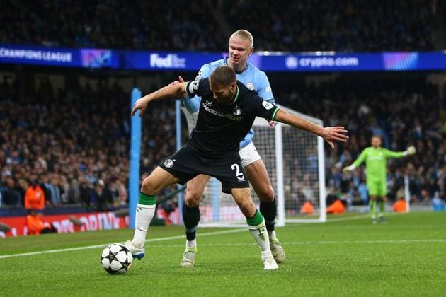 Erling Haaland of Manchester City and Baer Nieuwkoop of Feyenoord Manchester City v Feyenoord, UEFA Champions League, Group Stage, Football, Etihad Stadium, Manchester, UK - 26 Nov 2024 EDITORIAL USE ONLY No use with unauthorised audio, video, data, fixture lists, club league logos or live services. Online in-match use limited to 120 images, no video emulation. No use in betting, games or single club league player publications. Copyright: xPhilxOldham Shutterstockx 14940173n