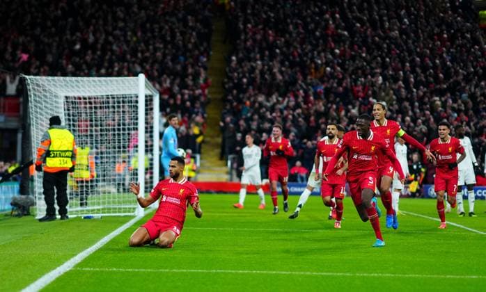 Cody Gakpo of Liverpool celebrates scoring a goal after making it 2-0 Liverpool v Real Madrid, UEFA Champions League, Group Stage, Football, Anfield, Liverpool, UK - 27 Nov 2024 EDITORIAL USE ONLY No use with unauthorised audio, video, data, fixture lists, club league logos or live services. Online in-match use limited to 120 images, no video emulation. No use in betting, games or single club league player publications. Copyright: xJavierxGarcia Shutterstockx 14945029ap