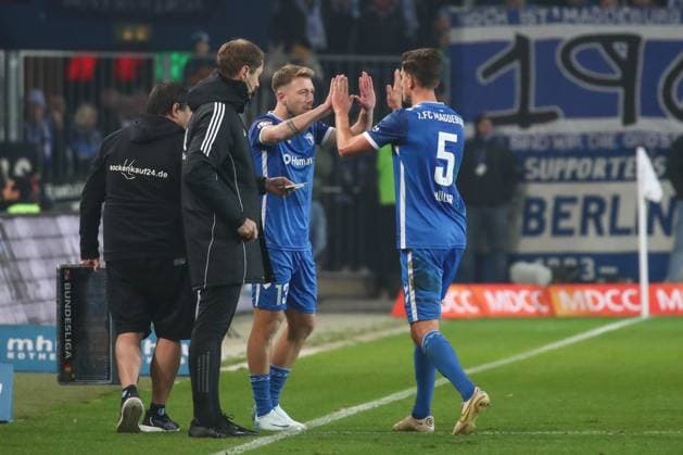 29.11.2024, xgox, Fussball 2. Bundesliga, 1. FC Magdeburg - Hertha BSC Berlin emspor, v.l. Connor Krempicki (Magdeburg, 13), Tobias Mueller (Müller, Magdeburg, 5) Einwechslung, Wechsel Auswechslung, Wechsel (DFL DFB REGULATIONS PROHIBIT ANY USE OF PHOTOGRAPHS as IMAGE SEQUENCES and or QUASI-VIDEO) Magdeburg