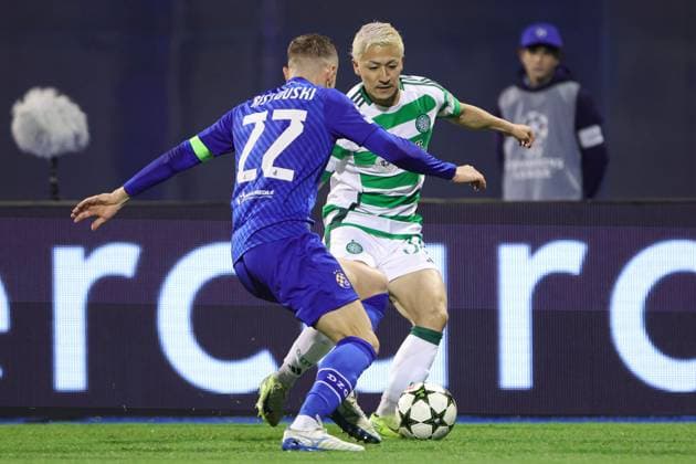Daizen Maeda of Celtic under pressure from Stefan Ristovski of Dinamo Zagreb Dinamo Zagreb v Celtic, UEFA Champions League, Group Stage, Football, Maksimir Stadium, Zagreb, Croatia, UK - 10 Dec 2024 EDITORIAL USE ONLY No use with unauthorised audio, video, data, fixture lists, club league logos or live services. Online in-match use limited to 120 images, no video emulation. No use in betting, games or single club league player publications. Copyright: xNikolaxKrstic Shutterstockx 14984446ae