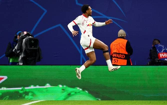 Lois Openda of RB Leipzig celebrates scoring a goal after making the score 1-1. RB Leipzig v Aston Villa, UEFA Champions League, Group Stage, Football, Red Bull Arena, Leipzig, Germany - 10 Dec 2024 EDITORIAL USE ONLY No use with unauthorised audio, video, data, fixture lists, club league logos or live services. Online in-match use limited to 120 images, no video emulation. No use in betting, games or single club league player publications. Copyright: xJamesxMarsh Shutterstockx 14984467aq