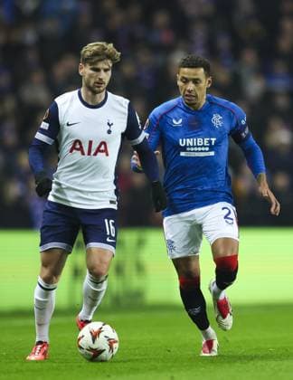 James Tavernier of Rangers in action with Timo Werner of Tottenham Hotspur during the UEFA Europa League group phase match at Ibrox Stadium, Glasgow. Rangers v Tottenham Hotspur, UEFA Europa League, Football, Ibrox Stadium, Glasgow, Scotland, UK - 12 Dec 2024 EDITORIAL USE ONLY No use with unauthorised audio, video, data, fixture lists, club league logos or live services. Online in-match use limited to 120 images, no video emulation. No use in betting, games or single club league player publications. Copyright: xLukexNickerson RangersxFC Shutterstockx 14998163b