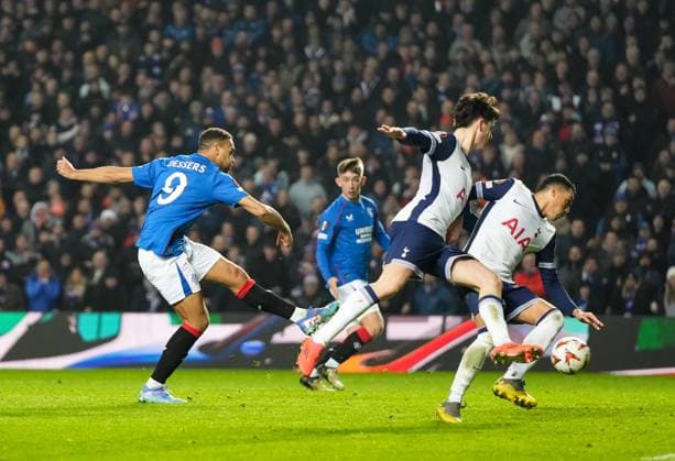 Cyriel Dessers of Rangers shoots at goal. Rangers v Tottenham Hotspur, UEFA Europa League, Group Stage, Football, Ibrox Stadium, Glasgow, Scotland - 12 Dec 2024 EDITORIAL USE ONLY No use with unauthorised audio, video, data, fixture lists, club league logos or live services. Online in-match use limited to 120 images, no video emulation. No use in betting, games or single club league player publications. Copyright: xStuartxWallace Shutterstockx 14985154co