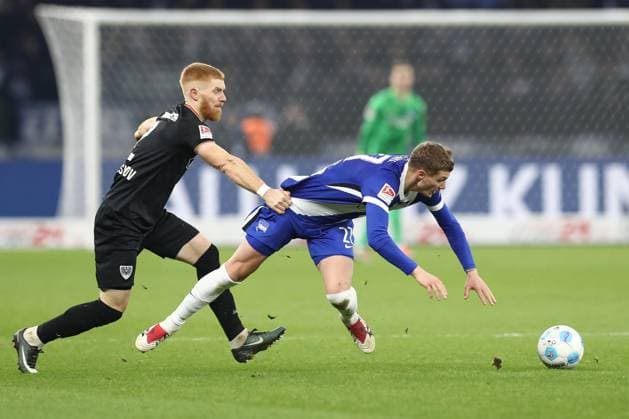 13.12.2024, xtgx, Fussball 2. Bundesliga, Hertha BSC Berlin - SC Preussen Muenster emspor, v.l. Mikkel Kirkesov (Münster, 2), Michael Cuisance (Hertha, 27) Zweikampf, Duell, Kampf, tackle (DFL DFB REGULATIONS PROHIBIT ANY USE OF PHOTOGRAPHS as IMAGE SEQUENCES and or QUASI-VIDEO) Berlin