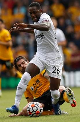 Wolverhampton Wanderers v Brentford - Premier League - Molineux September 18, 2021, Wolverhampton, United Kingdom: Wolverhampton, England, 18th September 2021. Ruben Neves of Wolverhampton Wanderers challenges Shandon Baptiste of Brentford during the Premier League match at Molineux, Wolverhampton. Picture credit should read: Darren Staples Sportimage Wolverhampton United Kingdom EDITORIAL USE ONLY Copyright: xx ZUMA-20210918_zaf_si1_021.jpg DarrenxStaplesx csmphototwo790504