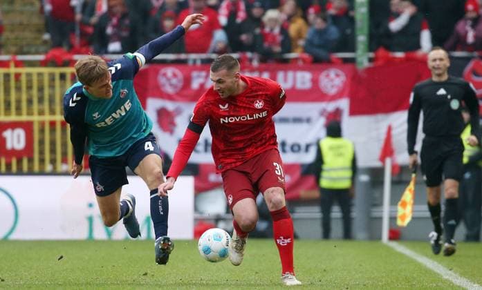 Timo Hübers (4, FC Köln), Luca Sirch (31, FC Kaiserslautern) 22.12.2024, Fußball, 2. Bundesliga, 1. FC Kaiserslautern - 1. FC Köln, 17. Spieltag, Saison 2024 25, Fritz Walter Stadion, Kaiserslautern, Deutschland, zmdz, ** DFB & DFL regulations prohibit any use of photographs as image sequences and or quasi-video. ** 1. FC Kaiserslautern - 1. FC Köln