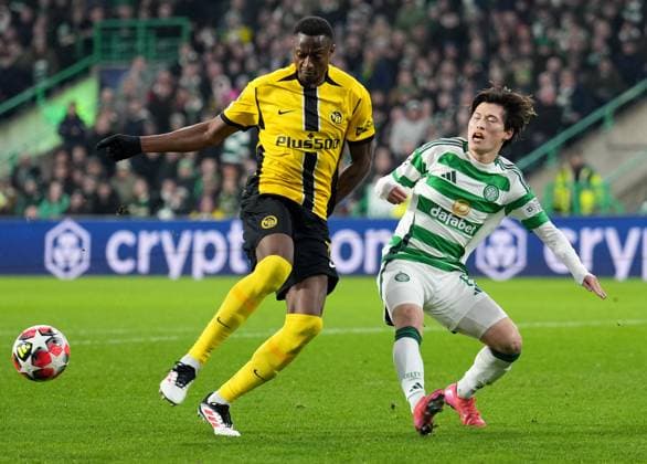 cel8 Celtic s Kyogo Furuhashi and Mohamed Ali Camara of BSC Young Boys during UEFA Champions League - Match Day 7 of 8 between Celtic FC and BSC Young Boys at Celtic Park, on 22nd January 2025 in Glasgow, Scotland. (Picture by Mark Runnacles) Celtic v Young Boys, UEFA Champions League, Group Stage, Football, Celtic Park, Glasgow, UK - 22 Jan 2025 EDITORIAL USE ONLY No use with unauthorised audio, video, data, fixture lists, club league logos or live services. Online in-match use limited to 120 images, no video emulation. No use in betting, games or single club league player publications. Copyright: xMarkxRunnacles Shutterstockx 15108894ak
