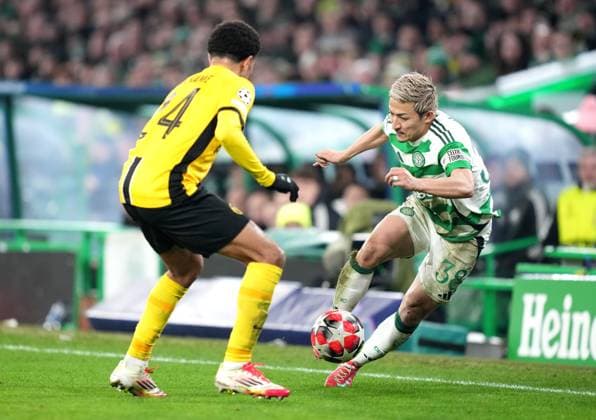 Celtic s Daizen Maeda and Zachsary Athekame of BSC Young Boys during UEFA Champions League - Match Day 7 of 8 between Celtic FC and BSC Young Boys at Celtic Park, on 22nd January 2025 in Glasgow, Scotland. (Picture by Mark Runnacles) Celtic v Young Boys, UEFA Champions League, Group Stage, Football, Celtic Park, Glasgow, UK - 22 Jan 2025 EDITORIAL USE ONLY No use with unauthorised audio, video, data, fixture lists, club league logos or live services. Online in-match use limited to 120 images, no video emulation. No use in betting, games or single club league player publications. Copyright: xMarkxRunnacles Shutterstockx 15108894eh