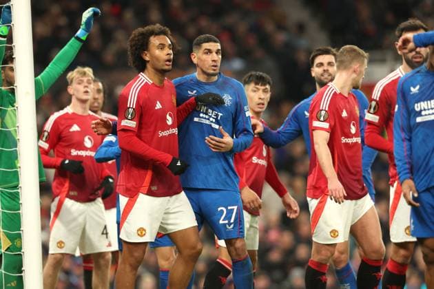 Joshua Zirkee of Manchester United, ManU and Leon Balogun of Rangers during the Europa League group phase match at Old Trafford, Manchester. Manchester United v Rangers, UEFA Europa League, Group Stage, Football, Old Trafford, Manchester, UK - 23 Jan 2025 EDITORIAL USE ONLY No use with unauthorised audio, video, data, fixture lists, club league logos or live services. Online in-match use limited to 120 images, no video emulation. No use in betting, games or single club league player publications. Copyright: xRangersxFC Shutterstockx 15111693fq
