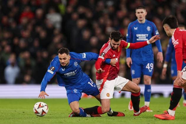 Nedim Bajrami of Rangers is challenged by Bruno Fernandes of Manchester United, ManU Manchester United v Rangers, UEFA Europa League, Group Stage, Football, Old Trafford, Manchester, UK - 23 Jan 2025 EDITORIAL USE ONLY No use with unauthorised audio, video, data, fixture lists, club league logos or live services. Online in-match use limited to 120 images, no video emulation. No use in betting, games or single club league player publications. Copyright: xPaulxCurrie Shutterstockx 15108899de