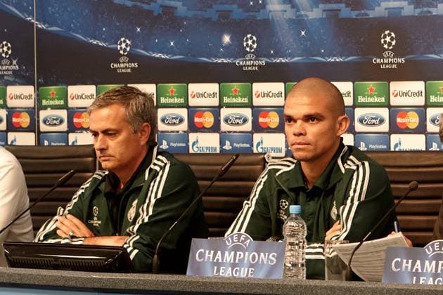 MANCHESTER, UNITED KINGDOM: 21 NOVEMBER 2012 Real Madrid head coach Josà Mourinho (2nd left) and Real Madrid player Pepe (2nd right) address the media during the Real Madrid press conference, PK, Pressekonferenz on the eve of the UEFA Champions League Group D soccer match between Manchester City and Real Madrid at the Etihad Stadium, United Kingdom on 21 November 2012. Manchester City FC v Real Madrid FC UCL_2012-2013