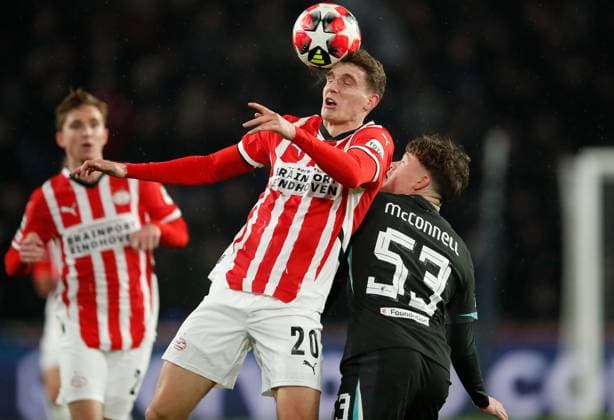 Guus Til of PSV Eindhoven and James McConnell of Liverpool in action PSV Eindhoven v Liverpool, UEFA Champions League, Group Stage, Football, Philips Stadion, Eindhoven, Netherlands - 29 Jan 2025 EDITORIAL USE ONLY No use with unauthorised audio, video, data, fixture lists, club league logos or live services. Online in-match use limited to 120 images, no video emulation. No use in betting, games or single club league player publications. Copyright: xBartxStoutjesdijk Shutterstockx 15122172k