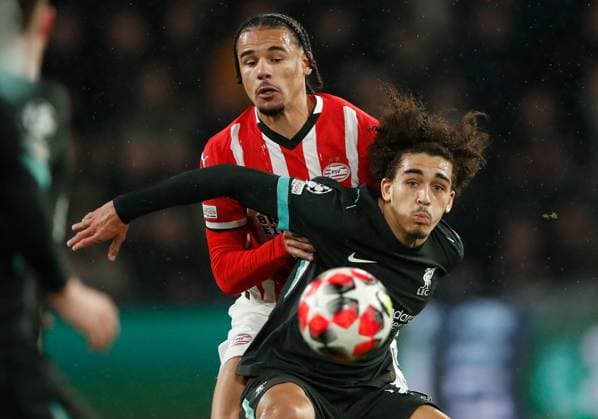 Armando Obispo of PSV Eindhoven and Jayden Danns of Liverpool PSV Eindhoven v Liverpool, UEFA Champions League, Group Stage, Football, Philips Stadion, Eindhoven, Netherlands - 29 Jan 2025 EDITORIAL USE ONLY No use with unauthorised audio, video, data, fixture lists, club league logos or live services. Online in-match use limited to 120 images, no video emulation. No use in betting, games or single club league player publications. Copyright: xBartxStoutjesdijk Shutterstockx 15122172l