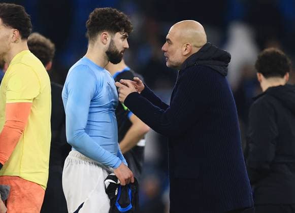 Manchester City manager Pep Guardiola speaks with Josko Gvardiol at the end of the match Manchester City v Club Brugge, UEFA Champions League, Group Stage, Football, Etihad Stadium, Manchester, UK - 29 Jan 2025 EDITORIAL USE ONLY No use with unauthorised audio, video, data, fixture lists, club league logos or live services. Online in-match use limited to 120 images, no video emulation. No use in betting, games or single club league player publications. Copyright: xMattxWest Shutterstockx 15122170bi