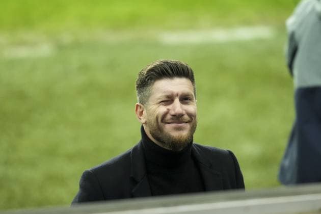 Union Saint-Gilloise Manager Sebastien Pocognoli winks at a fan before kick off Rangers v Union Saint-Gilloise, UEFA Europa League, Group Stage, Football, Ibrox Stadium, Glasgow, UK - 30 Jan 2025 EDITORIAL USE ONLY No use with unauthorised audio, video, data, fixture lists, club league logos or live services. Online in-match use limited to 120 images, no video emulation. No use in betting, games or single club league player publications. Copyright: xStuartxWallace Shutterstockx 15122181af