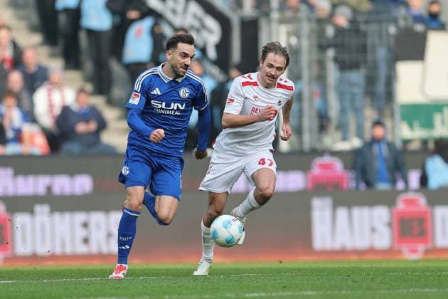 GER, 2.FBL, 1. FC Koeln vs. FC Schalke 04 09.02.2025, Rheinenergie Stadion, Koeln, GER, 2.FBL, 1. FC Koeln vs. FC Schalke 04, im Bild: Mathias Olesen (FC Koeln 47), im Zweikampf gegen Kenan Karaman (Schalke 19),