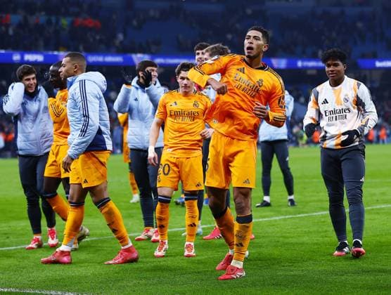 Jude Bellingham of Real Madrid celebrates at the end of the match Manchester City v Real Madrid, UEFA Champions League, Knockout Round Play-offs, First Leg, Football, Etihad Stadium, Manchester, UK - 11 Feb 2025 EDITORIAL USE ONLY No use with unauthorised audio, video, data, fixture lists, club league logos or live services. Online in-match use limited to 120 images, no video emulation. No use in betting, games or single club league player publications. Copyright: xJavierxGarcia Shutterstockx 15136820bp