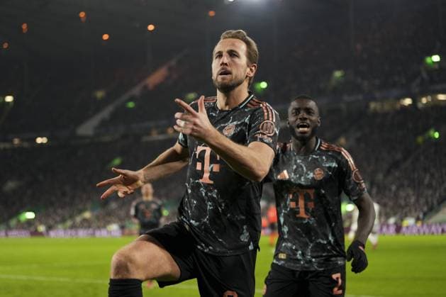 Harry Kane of Bayern Munich celebrates with Dayot Upamecano of Bayern Munich after scoring to give Bayern Munich a 0-2 lead Celtic v Bayern Munich, UEFA Champions League, Knockout Round Play-offs, First Leg, Football, Celtic Park, Glasgow, UK - 12 Feb 2025 EDITORIAL USE ONLY No use with unauthorised audio, video, data, fixture lists, club league logos or live services. Online in-match use limited to 120 images, no video emulation. No use in betting, games or single club league player publications. Copyright: xStuartxWallace Shutterstockx 15136907cp