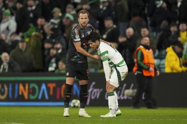 Harry Kane of Bayern Munich pats dejected Reo Hatate of Celtic on the back after final whistle Celtic v Bayern Munich, UEFA Champions League, Knockout Round Play-offs, First Leg, Football, Celtic Park, Glasgow, UK - 12 Feb 2025 EDITORIAL USE ONLY No use with unauthorised audio, video, data, fixture lists, club league logos or live services. Online in-match use limited to 120 images, no video emulation. No use in betting, games or single club league player publications. Copyright: xStuartxWallace Shutterstockx 15136907ek