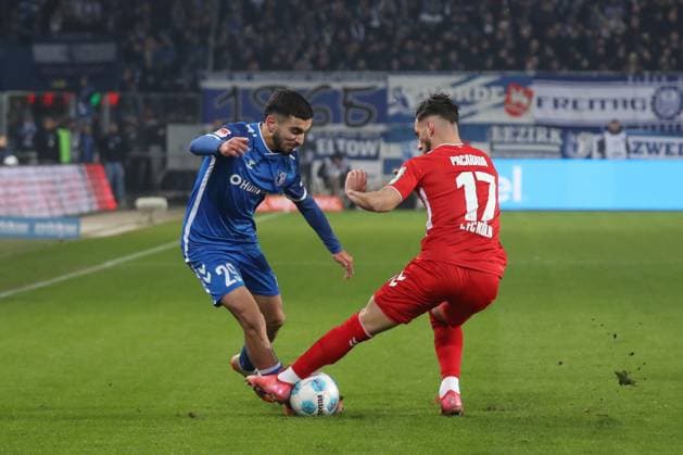14.02.2025, xgox, Fussball 2. Bundesliga, 1. FC Magdeburg - 1. FC Koeln emspor, v.l. Livian Burcu (Magdeburg, 29), Dejan Ljubicic (Koeln, 7) Zweikampf, Duell, Kampf, tackle (DFL DFB REGULATIONS PROHIBIT ANY USE OF PHOTOGRAPHS as IMAGE SEQUENCES and or QUASI-VIDEO) Magdeburg