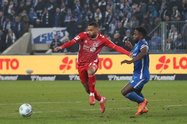 14.02.2025, xgox, Fussball 2. Bundesliga, 1. FC Magdeburg - 1. FC Koeln emspor, v.l. Linton Maina (Koeln, 37), Daniel Heber (Magdeburg, 15) Zweikampf, Duell, Kampf, tackle (DFL DFB REGULATIONS PROHIBIT ANY USE OF PHOTOGRAPHS as IMAGE SEQUENCES and or QUASI-VIDEO) Magdeburg