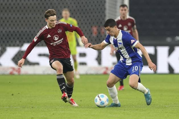 21.02.2025, xtgx, Fussball - 2.Bundesliga, Hertha BSC Berlin - 1.FC Nuernberg emspor, v.l. Caspar Jander (Nuernberg, 20), Ibrahim Maza (Hertha, 10) Zweikampf, Duell, Kampf, tackle (DFL DFB REGULATIONS PROHIBIT ANY USE OF PHOTOGRAPHS as IMAGE SEQUENCES and or QUASI-VIDEO) Berlin