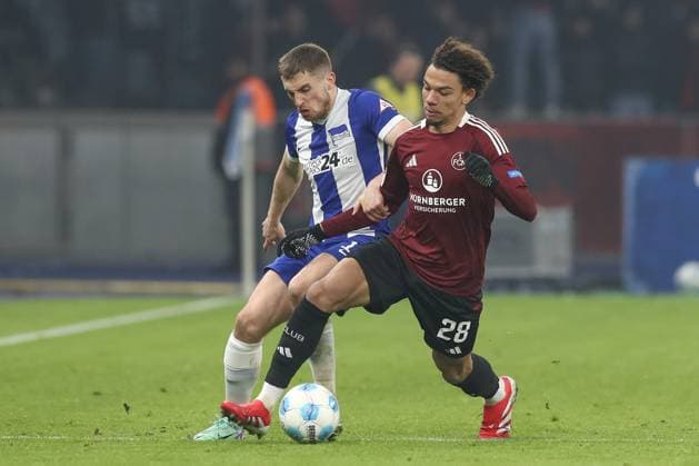 21.02.2025, xtgx, Fussball - 2.Bundesliga, Hertha BSC Berlin - 1.FC Nuernberg emspor, v.l. Jonjoe Kenny (Hertha, 16), Janis Antiste (Nuernberg, 28) Zweikampf, Duell, Kampf, tackle (DFL DFB REGULATIONS PROHIBIT ANY USE OF PHOTOGRAPHS as IMAGE SEQUENCES and or QUASI-VIDEO) Berlin