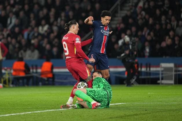 A mad scramble in the penalty area as Darwin Nunez of Liverpool, Marquinhos of PSG and Gianluigi Donnarumma of PSG all compete for a loose ball Paris Saint-Germain v Liverpool, UEFA Champions League, Round of 16, First Leg, Football, Parc des Princes, Paris, France - 05 Mar 2025 EDITORIAL USE ONLY No use with unauthorised audio, video, data, fixture lists, club league logos or live services. Online in-match use limited to 120 images, no video emulation. No use in betting, games or single club league player publications. Copyright: xDavexWinter Shutterstockx 15178313bn