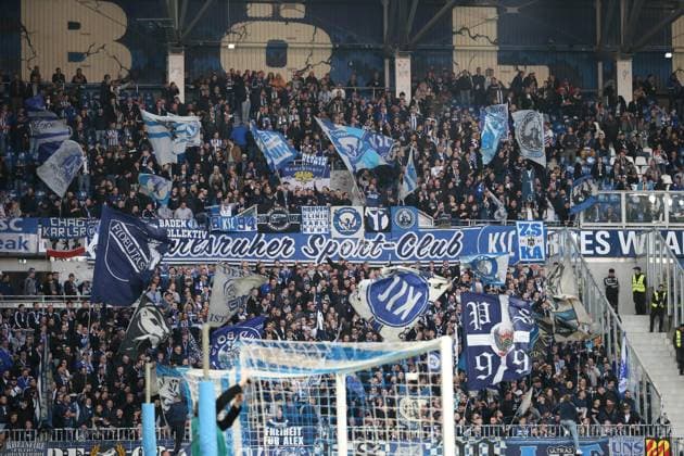 07.03.2025, xrekx, Fussball 2.Bundesliga, SV Darmstadt 98 - Karlsruher SC v.l. KSC Fans ,Stimmung, Schals, Trikot, Fahne, Banner, Ultras, Zuschauer, Besucher, Choreo, Choreografie, atmosphere, spectators, Visitors (DFL DFB REGULATIONS PROHIBIT ANY USE OF PHOTOGRAPHS as IMAGE SEQUENCES and or QUASI-VIDEO) Darmstadt