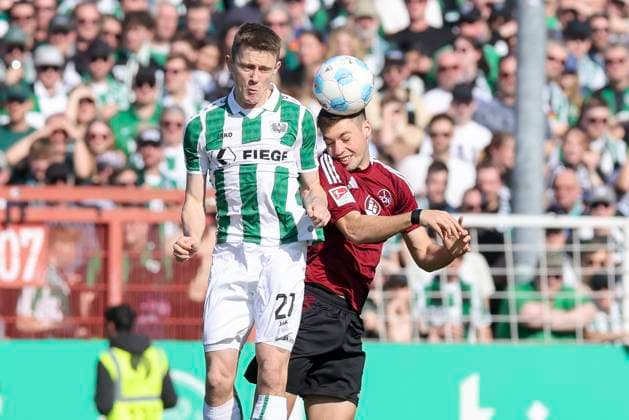 Jano Ter Horst (SC Preussen Muenster) und Stefanos Tzimas (1. FC Nuernberg) kaempfen um den Ball, 2. Bundesliga, Preußen Münster vs 1. FC Nürnberg, Preußenstadion am 09. March 2025 in Münster, Deutschland. (Foto von Marco Steinbrenner DeFodi Images) Jano Ter Horst (SC Preussen Muenster) und Stefanos Tzimas (1. FC Nuernberg) battle for the ball, 2. Bundesliga, Preußen Münster vs 1. FC Nürnberg, Preußenstadion, March 9, 2025 in Münster, Germany. (Photo by Marco Steinbrenner DeFodi Images) DFB DFL REGULATIONS PROHIBIT ANY USE OF PHOTOGRAPHS AS IMAGE SEQUENCES AND OR QUASI-VIDEO.