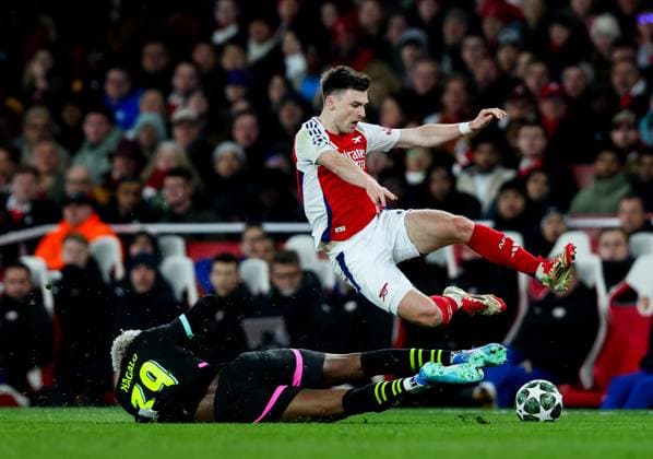 Kieran Tierney of Arsenal tackled by Adamo Nagalo of PSV Eindhoven Arsenal v PSV Eindhoven, UEFA Champions League, Round of 16, Second Leg, Football, Emirates Stadium, London, UK - 12 Mar 2025 EDITORIAL USE ONLY No use with unauthorised audio, video, data, fixture lists, club league logos or live services. Online in-match use limited to 120 images, no video emulation. No use in betting, games or single club league player publications. Copyright: xAndrewxFosker Shutterstockx 15188185br