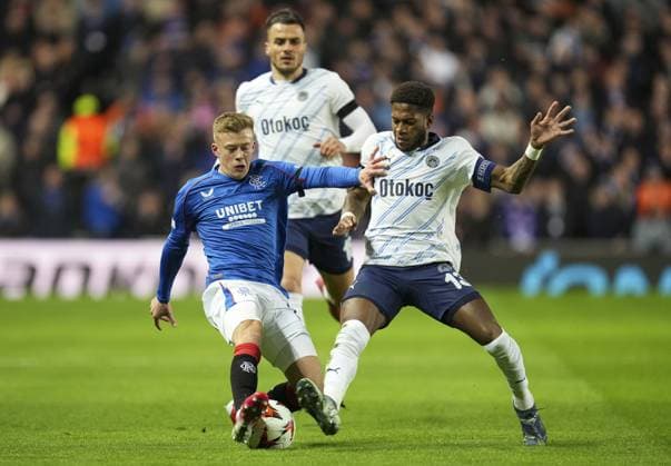 Connor Barron of Rangers battles with Fred of Fenerbahce SK Rangers v Fenerbahce, UEFA Europa League, Round of 16, Second Leg, Football, Ibrox Stadium, Glasgow, Scotland, UK - 13 Mar 2025 EDITORIAL USE ONLY No use with unauthorised audio, video, data, fixture lists, club league logos or live services. Online in-match use limited to 120 images, no video emulation. No use in betting, games or single club league player publications. Copyright: xStuartxWallace Shutterstockx 15188226bs