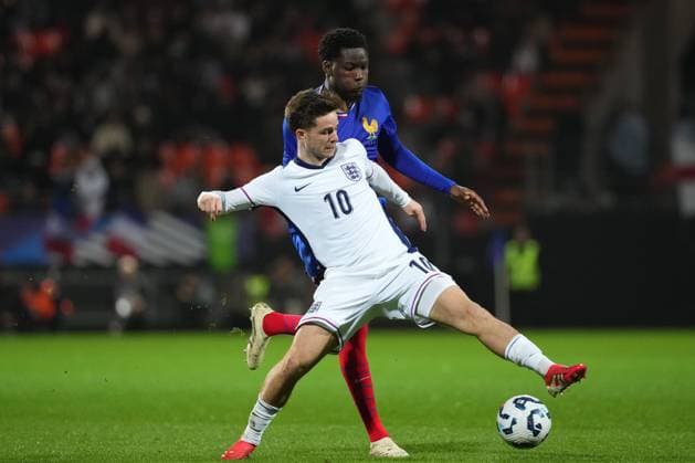 James McAtee of England and Lucien Agoume of France France U21, U 21 v England U21, International Friendly, Länderspiel, Nationalmannschaft Football, Stade du Moustoir, Lorient, France - 21 Mar 2025 EDITORIAL USE ONLY No use with unauthorised audio, video, data, fixture lists, club league logos or live services. Online in-match use limited to 120 images, no video emulation. No use in betting, games or single club league player publications. Copyright: xDavexWinter Shutterstockx 15215626ba