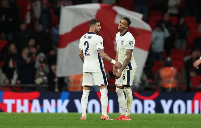 London, England, 21st March 2025. Kyle Walker and Ezri Konsa of England shake hands after the FIFA World Cup, WM, Weltmeisterschaft, Fussball European Qualifying match at Wembley Stadium, London. Picture credit should read: Paul Terry Sportimage EDITORIAL USE ONLY. No use with unauthorised audio, video, data, fixture lists, club league logos or live services. Online in-match use limited to 120 images, no video emulation. No use in betting, games or single club league player publications. SPI_032_PT_England_Albania SPI-3761-0032