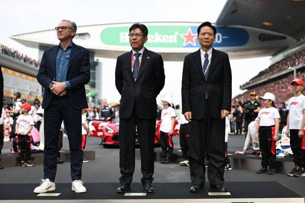 F1 - CHINESE GRAND PRIX 2025 DOMENICALI Stefano (ita), Chairman and CEO Formula One Group FOG, portrait, ZHAN GUOJUN portrait, LU FANGZHOU portrait in the grid during the Formula 1 Heineken Chinese Grand Prix 2025, 2nd round of the 2025 FIA Formula One World Championship, WM, Weltmeisterschaft from March 21 to 23, 2025 on the Shanghai International Circuit, in Shanghai, China - ShanghaiChina Copyright: xJavierxJimenezx
