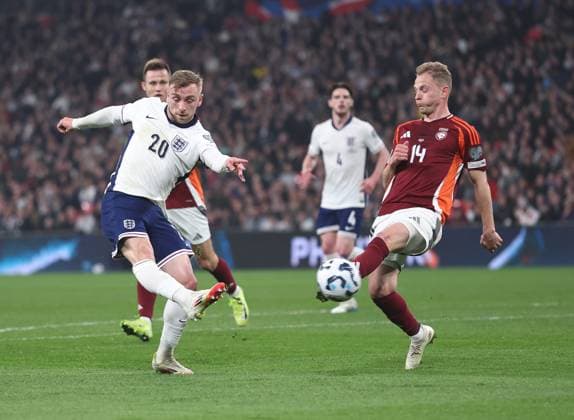 London, England, 24th March 2025. Jarrod Bowen of England takes a shot on goal despite Andrejs Ciganiks of Latvia closing him down during the FIFA World Cup, WM, Weltmeisterschaft, Fussball European Qualifying match at Wembley Stadium, London. Picture credit should read: David Klein Sportimage EDITORIAL USE ONLY. No use with unauthorised audio, video, data, fixture lists, club league logos or live services. Online in-match use limited to 120 images, no video emulation. No use in betting, games or single club league player publications. SPI_021_DK_England_Latvia SPI-3762-0021