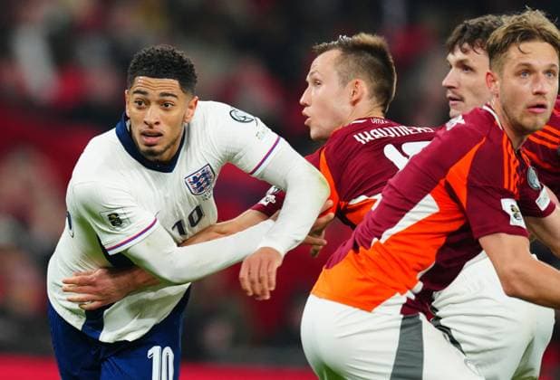 Jude Bellingham of England grapples with Alvis Jaunzems of Latvia at a corner England v Latvia, FIFA 2026 World Cup Qualifying, Group K, Football, Wembley Stadium, London, UK - 24 Mar 2025 EDITORIAL USE ONLY No use with unauthorised audio, video, data, fixture lists, club league logos or live services. Online in-match use limited to 120 images, no video emulation. No use in betting, games or single club league player publications. Copyright: xJavierxGarcia Shutterstockx 15219744v