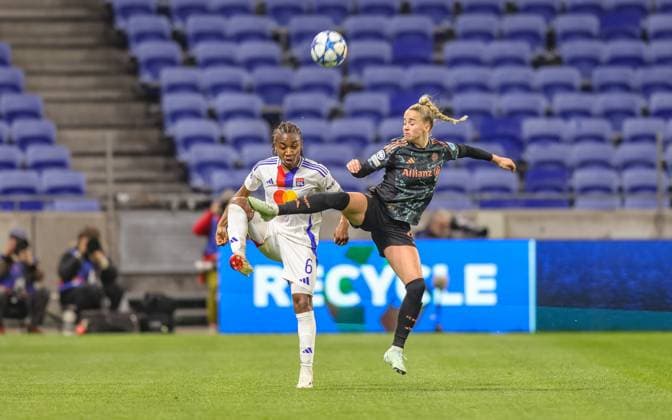 FRA, Lyon, Olympique Lyon vs FC Bayern München, Women s Champions League, Fussball, UEFA, Spielzeit 2024 2025, Groupama Stadium, Viertelfinale, im Bild v.l.: Melchie Dumornay (Olympique Lyon 6), Giulia Gwinn (FC Bayern München Frauen 7) DFB DFL REGULATIONS PROHIBIT ANY USE OF PHOTOGRAPHS AS IMAGE SEQUENCES AND OR QUASI-VIDEO, 26.03.2025, Copyright: HMBxMedia HendrikxHamelau