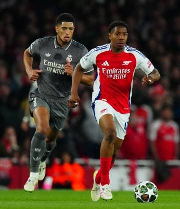 Myles Lewis-Skelly of Arsenal and Jude Bellingham of Real Madrid in action Arsenal v Real Madrid, UEFA Champions League, Quarter Final, First Leg, Football, Emirates Stadium, London, UK - 08 Apr 2025 EDITORIAL USE ONLY No use with unauthorised audio, video, data, fixture lists, club league logos or live services. Online in-match use limited to 120 images, no video emulation. No use in betting, games or single club league player publications. Copyright: xJavierxGarcia Shutterstockx 15243595s